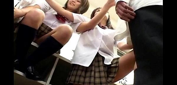  Two school girls enjoying some cock